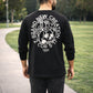 Black long sleeve Brand New Creation Tee, Back Male model walking on sidewalk, Christian Apparel