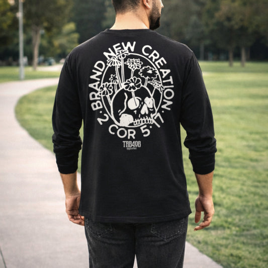Black long sleeve Brand New Creation Tee, Back Male model walking on sidewalk, Christian Apparel